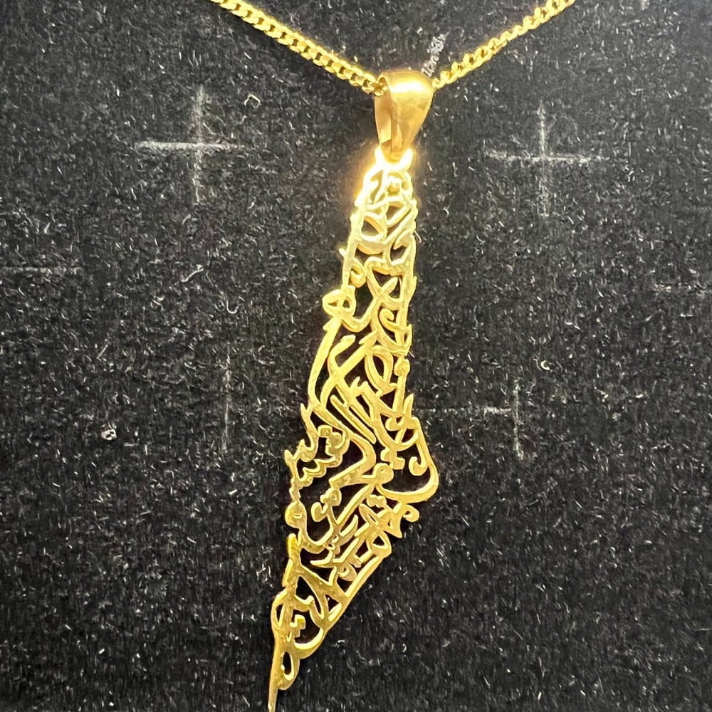 Customer photo review of Palestine Calligraphy Map Necklace