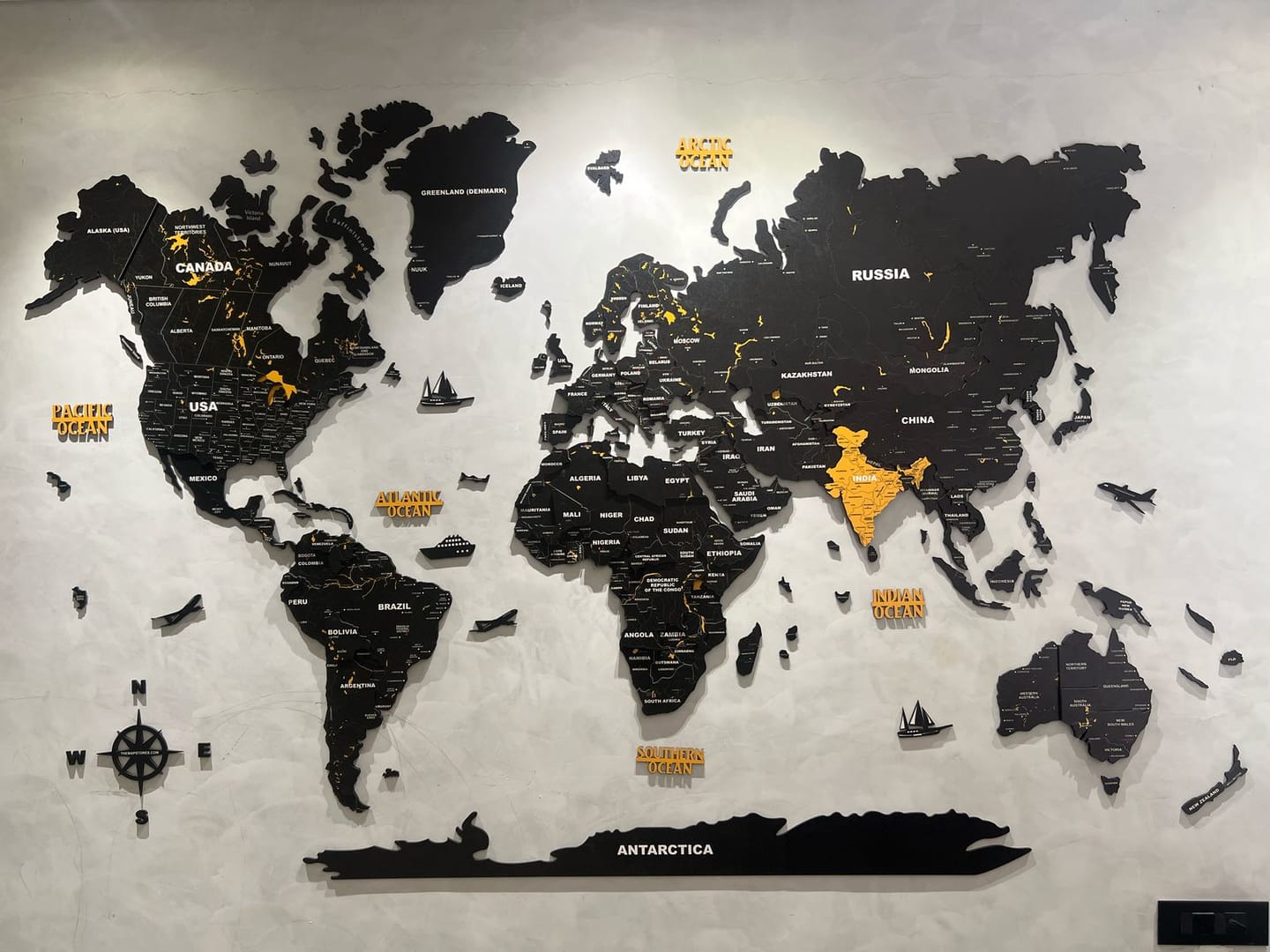 Customer photo review of 3D Black & Yellow Wooden World Map for wall