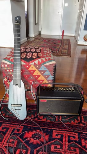 Customer photo review of Donner HUSH™ C  Acoustic-Electric Nylon string Classical Headless travel Guitar