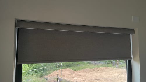Customer photo review of SmartWings Hardwired Motorized Roller Shades 100% Blackout Safari