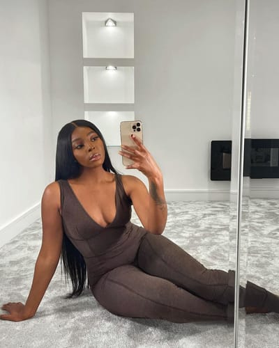 Customer photo review of Fuller Hair Extra Long Straight 30" Ready to Wear Glueless Wig Invisible Knots 5x5 Swiss HD Pre-Cut Lace Natural Black