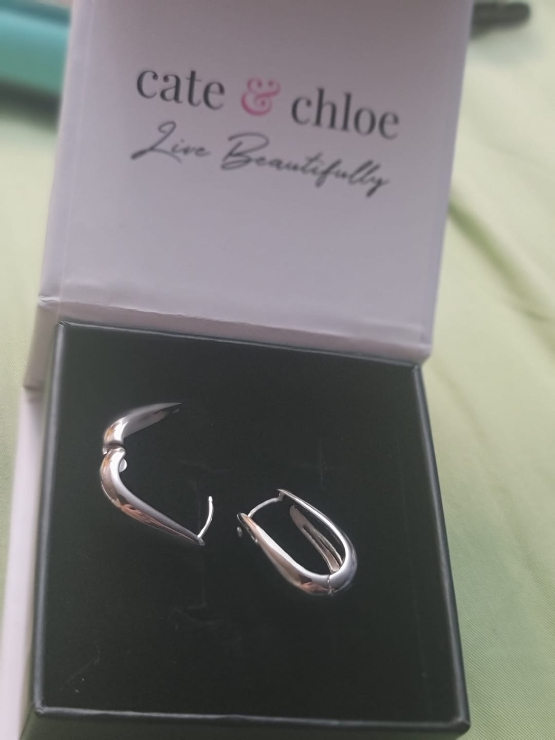 Customer photo review of Salma 18k White Gold Plated 15mm Chunky U-Shaped Hoop Earrings