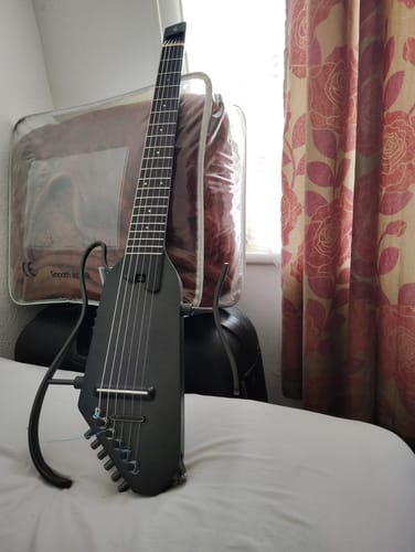 Customer photo review of Donner HUSH™ C  Acoustic-Electric Nylon string Classical Headless travel Guitar