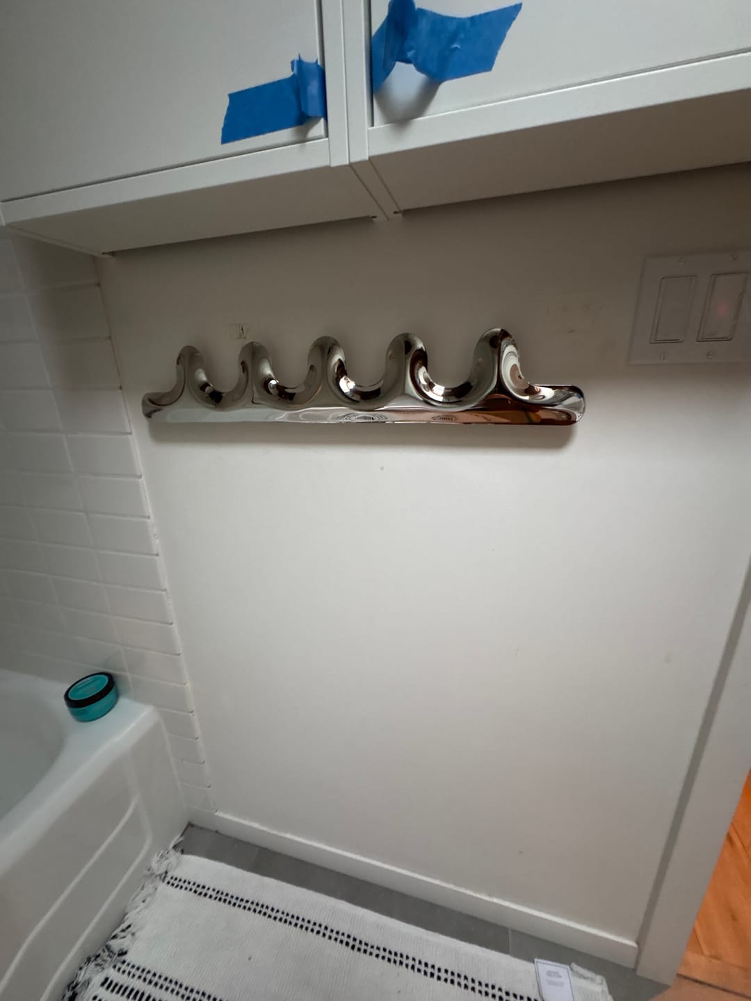 Customer photo review of Chrome Puffy Wall Hanger - 5 Coat Hanger