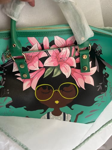 Customer photo review of AFROBRATS™ The Lily Jade Roller Bag