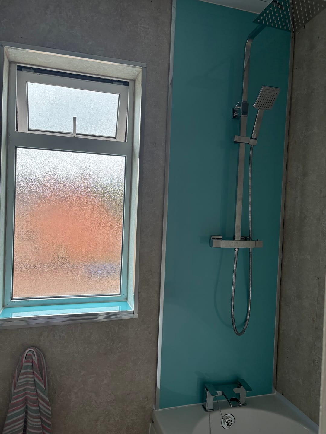 Customer photo review of 10mm Aqua Blue Shimmer Gloss Shower Panel 1M x 2.4M