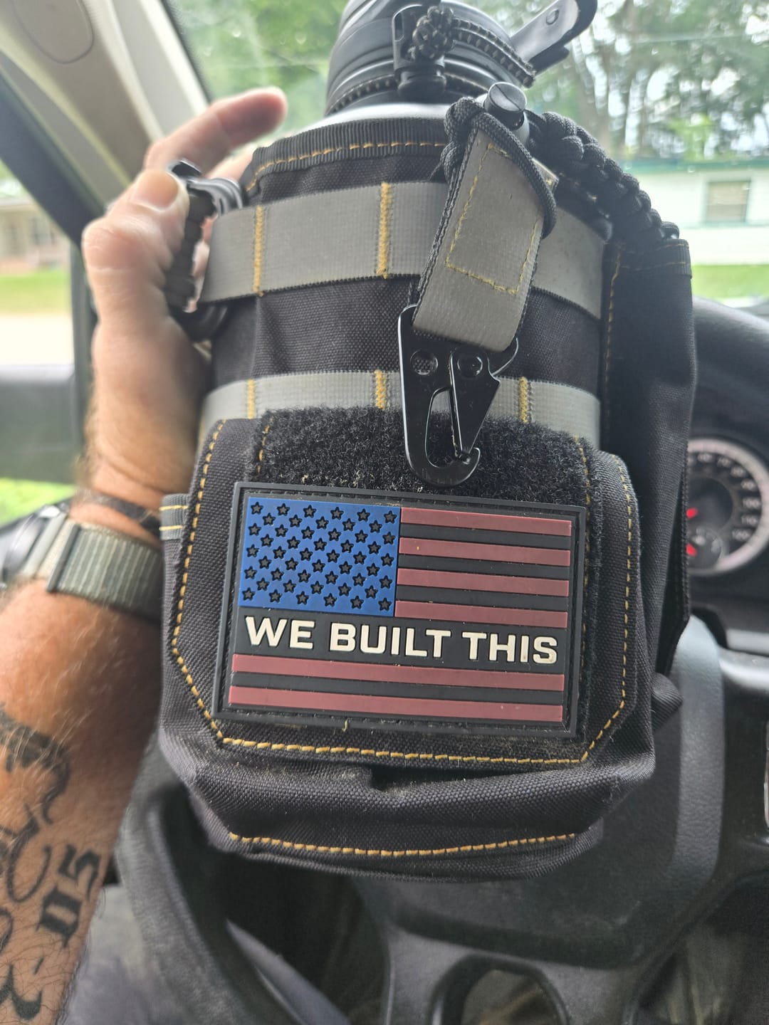 Customer photo review of 64oz Iron Workforce Bottles