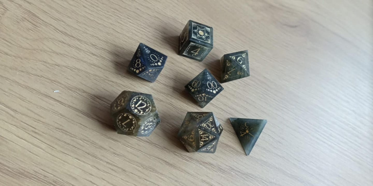 Customer photo review of URWizards D&D Labradorite Engraved Dice Set Lunar Eclipse