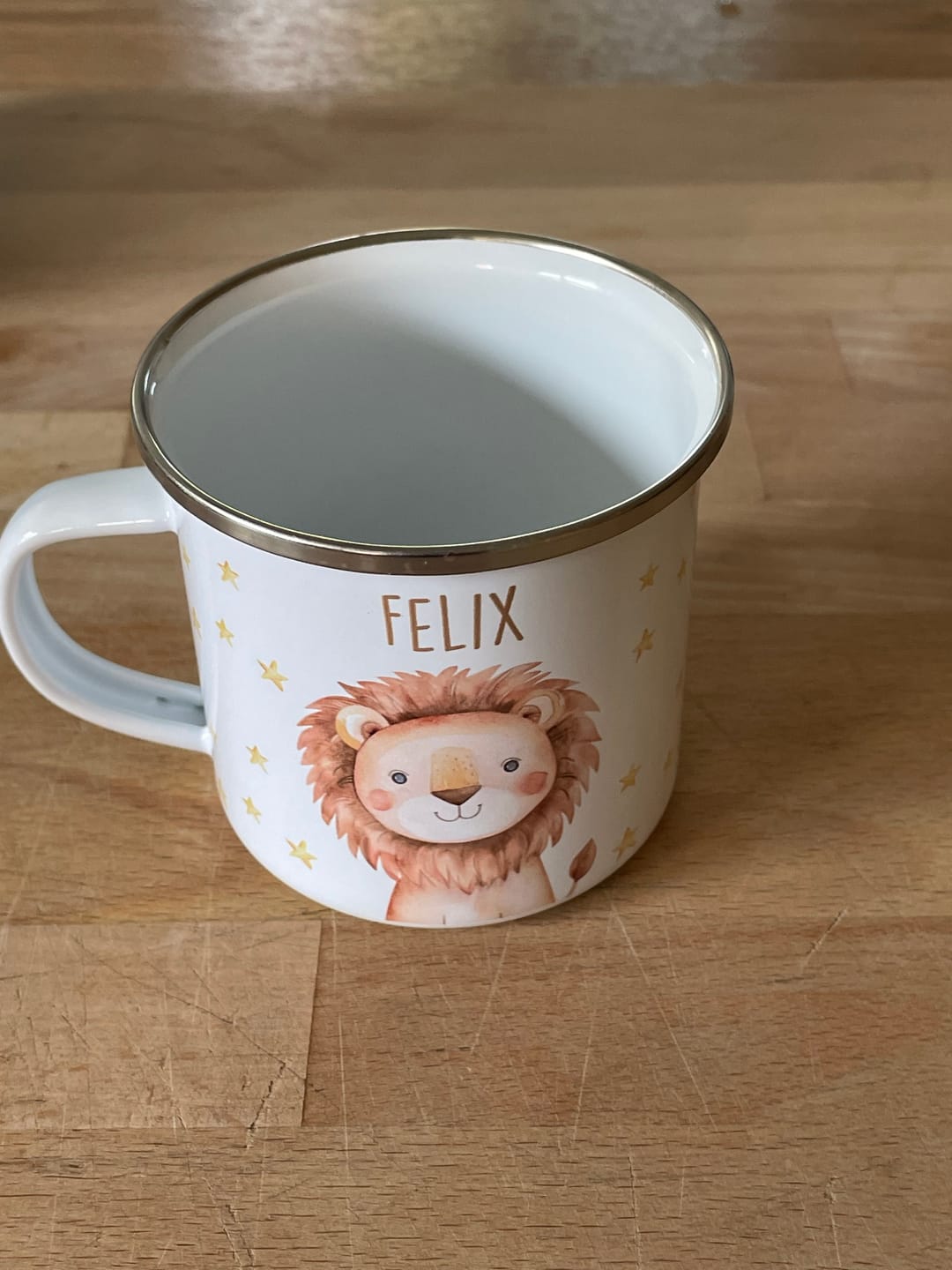 Customer photo review of Emaille Tasse personalisiert - Löwe mit Sternen