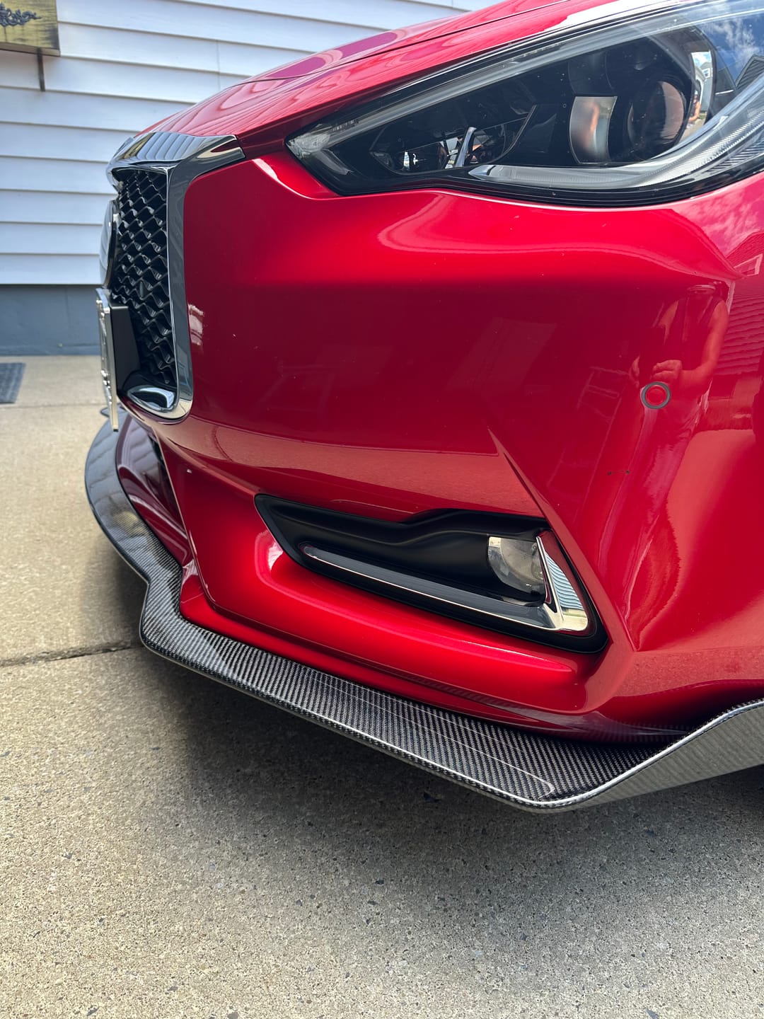 Customer photo review of 2017-Up Infiniti Q60 Carbon Fiber Front Splitter Ground Effect
