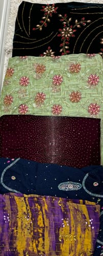 Customer photo review of Emerald Velvet Royal Embroidered Fabric – Golden & Ruby Floral Swirl Design (1 Yard)