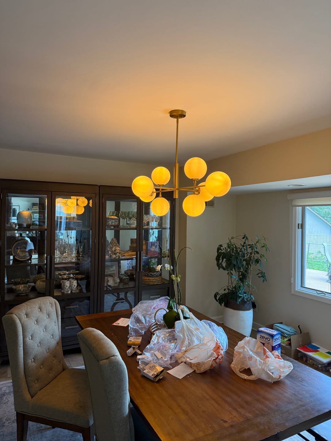 Customer photo review of 8-Light Linear Sputnik Frosted Glass Globe Chandelier