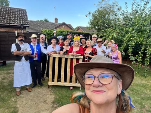 Customer photo review of Replay-able Cowboy Wild West Murder Mystery Dinner Game for Up to 20 Adults - Host Your Own Dinner Party Game Night - Cowboy & Wild West Theme - Cowboy Fancy Dress Dinner PartyV2
