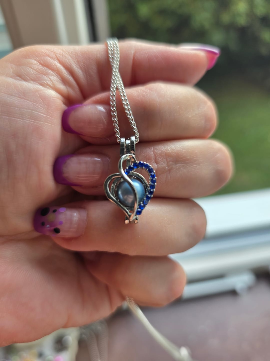 Customer photo review of Cage Pendant Silver Plated - S Heart Blue Rhinestones