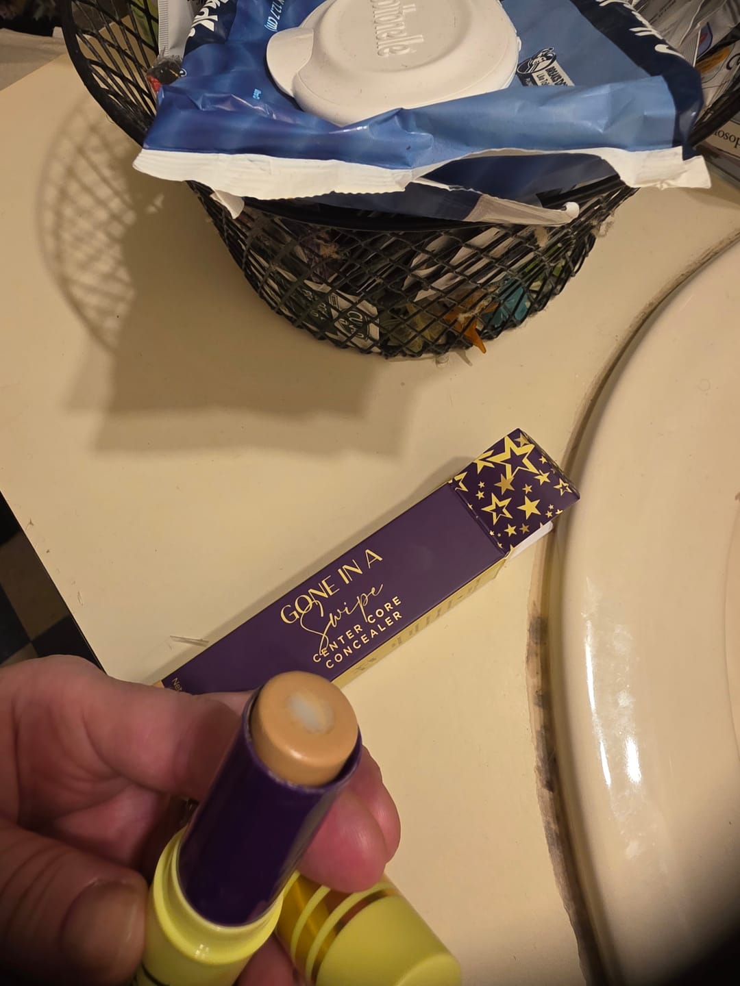 Customer photo review of Gone In A Swipe Center Core Concealer
