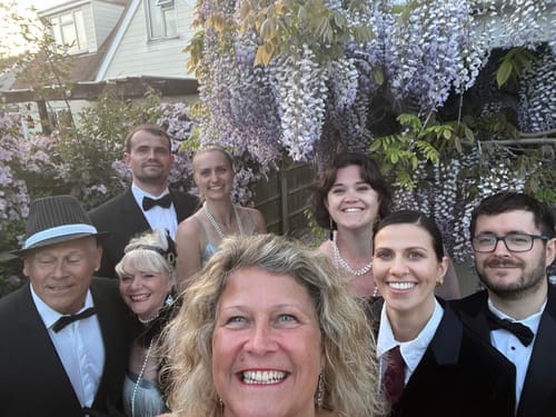 Customer photo review of Replay-able 1920s Murder Mystery Dinner Party Game for Up to 20 Adults - Host Your Own Dinner Party Game Night - 1920s Speakeasy Gatsby Theme - 1920s Fancy Dress Dinner Party(V2)