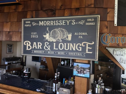 Customer photo review of Personalized Basement Bar Sign