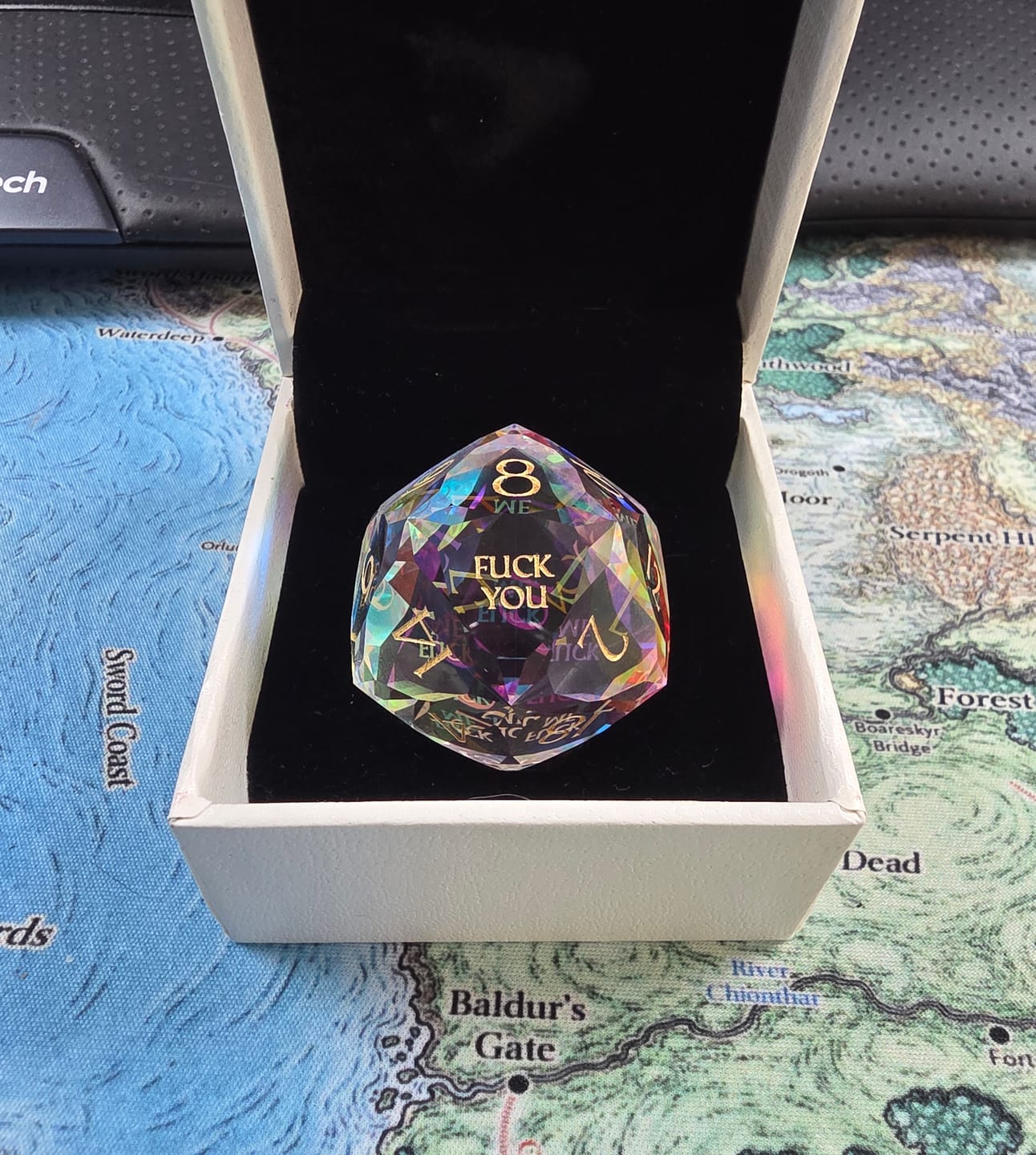 Customer photo review of URWizards D&D Multi-faceted Prism Glass Engraved Dice Set Fuck Style