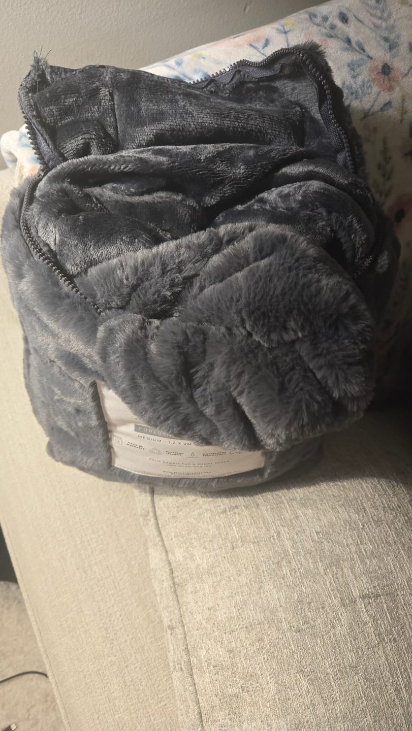 Customer photo review of Furlush Waterproof Squirt  Blanket™ - Stormy