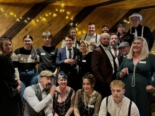 Customer photo review of Replay-able 1920s Murder Mystery Dinner Party Game for Up to 20 Adults - Host Your Own Dinner Party Game Night - 1920s Speakeasy Gatsby Theme - 1920s Fancy Dress Dinner Party(V2)