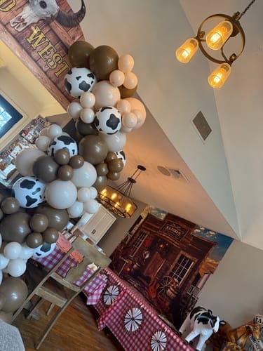 Customer photo review of Replay-able Cowboy Wild West Murder Mystery Dinner Game for Up to 20 Adults - Host Your Own Dinner Party Game Night - Cowboy & Wild West Theme - Cowboy Fancy Dress Dinner PartyV2