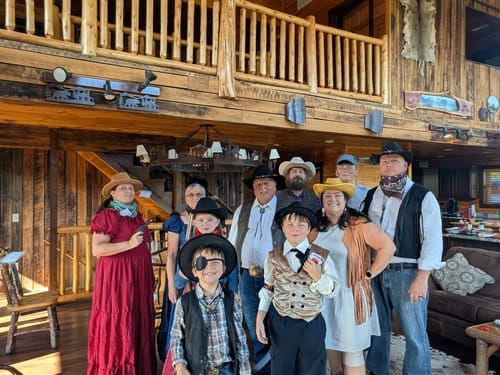 Customer photo review of Replay-able Cowboy Wild West Murder Mystery Dinner Game for Up to 20 Adults - Host Your Own Dinner Party Game Night - Cowboy & Wild West Theme - Cowboy Fancy Dress Dinner PartyV2