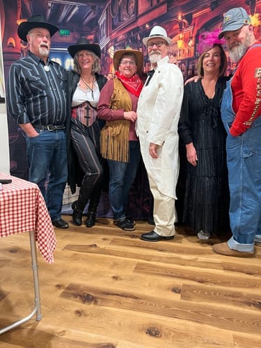 Customer photo review of Replay-able Cowboy Wild West Murder Mystery Dinner Game for Up to 20 Adults - Host Your Own Dinner Party Game Night - Cowboy & Wild West Theme - Cowboy Fancy Dress Dinner PartyV2