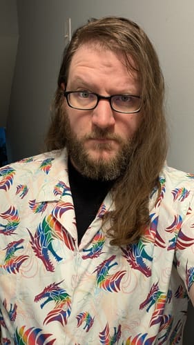 Customer photo review of Rainbow Dragons and Unicorns Button Up Shirt