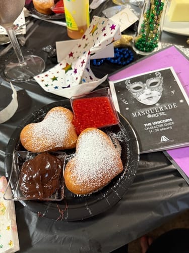 Customer photo review of Replay-able Masquerade Murder Mystery Dinner Party Game for Up to 20 Adults - Host Your Own Dinner Party Game Night - Masquerade Venetian Carnival Theme - Mardi Gras Fancy Dress Dinner Party V2