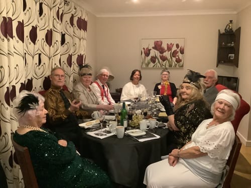 Customer photo review of Replay-able 1920s Murder Mystery Dinner Party Game for Up to 20 Adults - Host Your Own Dinner Party Game Night - 1920s Speakeasy Gatsby Theme - 1920s Fancy Dress Dinner Party(V2)