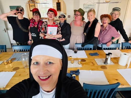 Customer photo review of Replay-able Wine Tasting Murder Mystery Dinner Party Game for Up to 20 Adults – Host Your Own Wine-Themed Game Night – Physical Kit