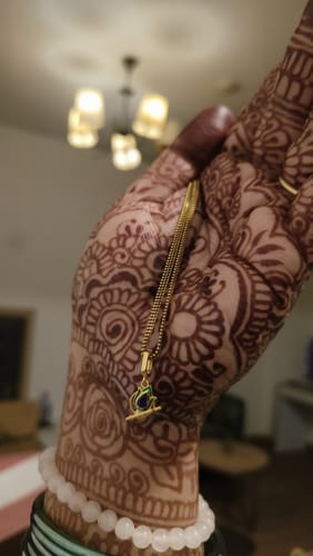 Customer photo review of Golden Kanha Charm