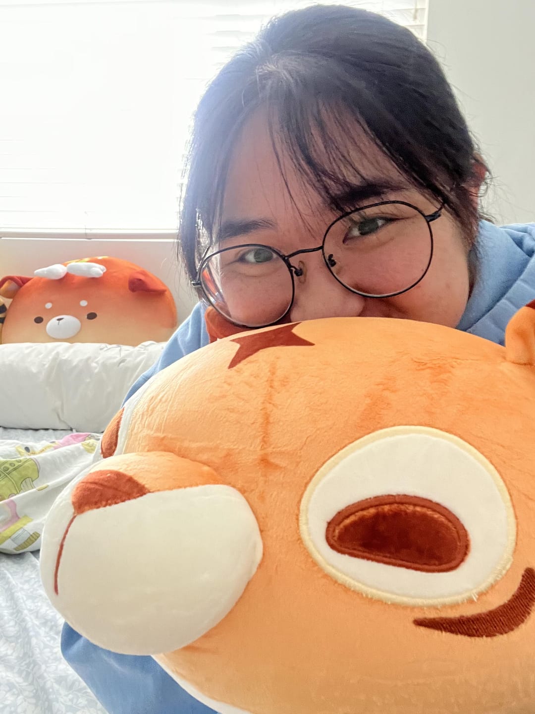 Customer photo review of GIANT Weighted Multi-Tiger Plush