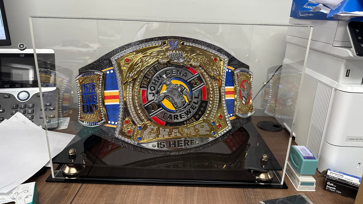 Customer photo review of Clear Acrylic Wrestling Belt Display Case (A014)