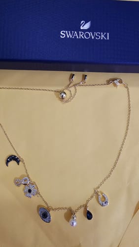 Customer photo review of COLLAR GARGANTILLA SWAROVSKI SIMBOLICA LUNA INFINITO TREBOL OJO HERRADURA ORO