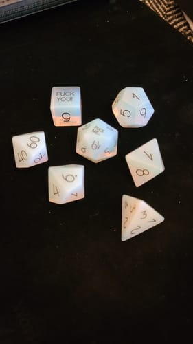 Customer photo review of URWizards D&D Opalite Gemstone Engraved Dice Set F*CK Style