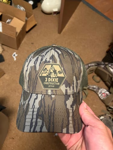 Customer photo review of [12 Pack] Mossy Oak Camouflage Leather Patch Trucker Hats
