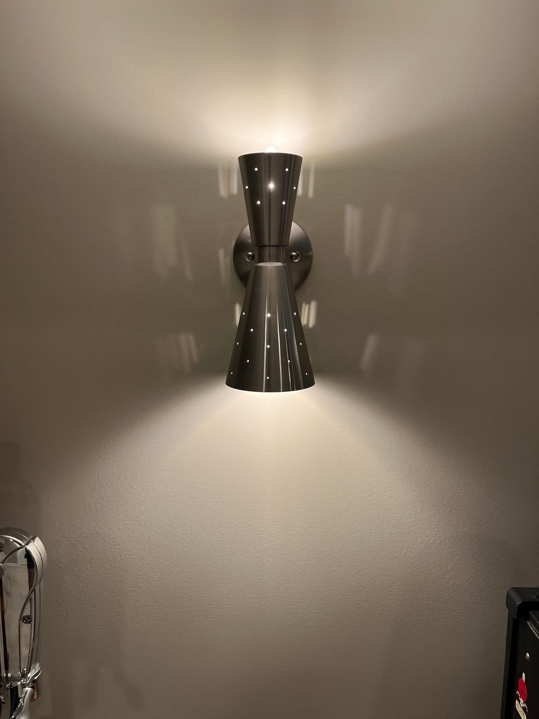 Customer photo review of 2-Light Metal Starry Hourglass Wall Sconce