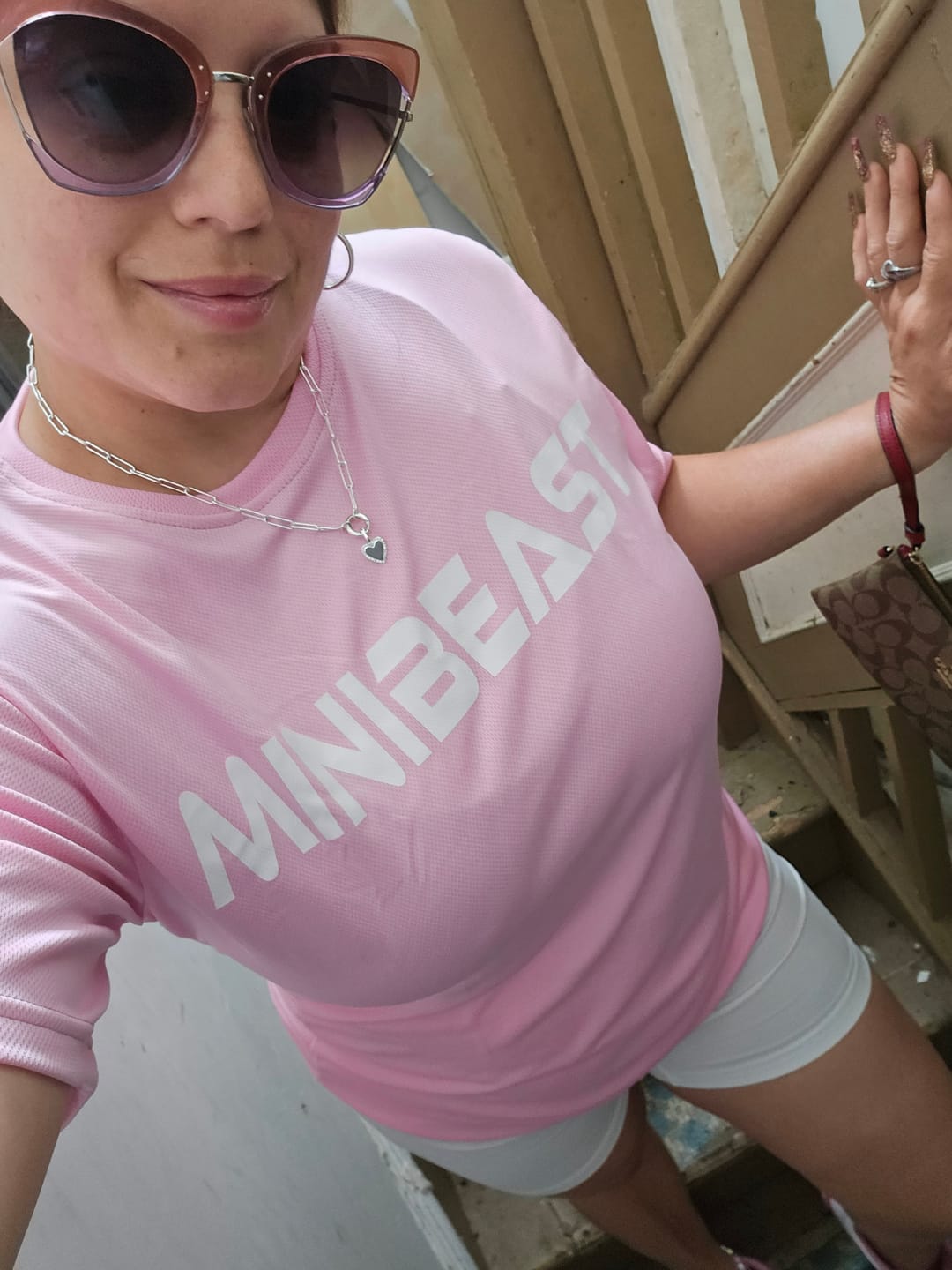 Customer photo review of "Girls Who Lift" Performance Unisex Tee