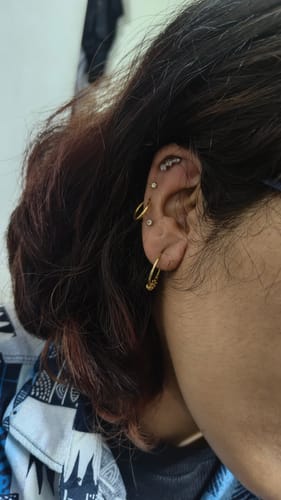 Customer photo review of Silver Thria Ear Piercings
