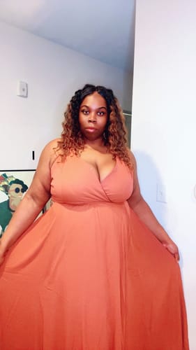 Customer photo review of PLUS SIZE SLEEVELESS SURPLICE OPEN BACK MAXI DRESS