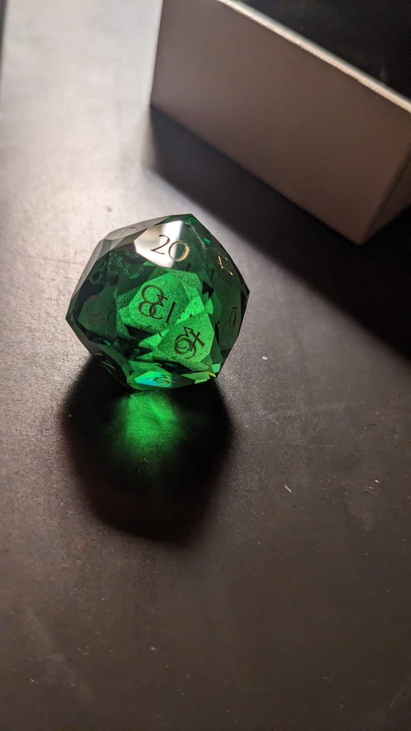 Customer photo review of URWizards D&D Multi-faceted Colorful Glass Engraved Dice Set