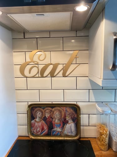 Customer photo review of Rustic Distressed Gold Metal Eat Wall Decoration