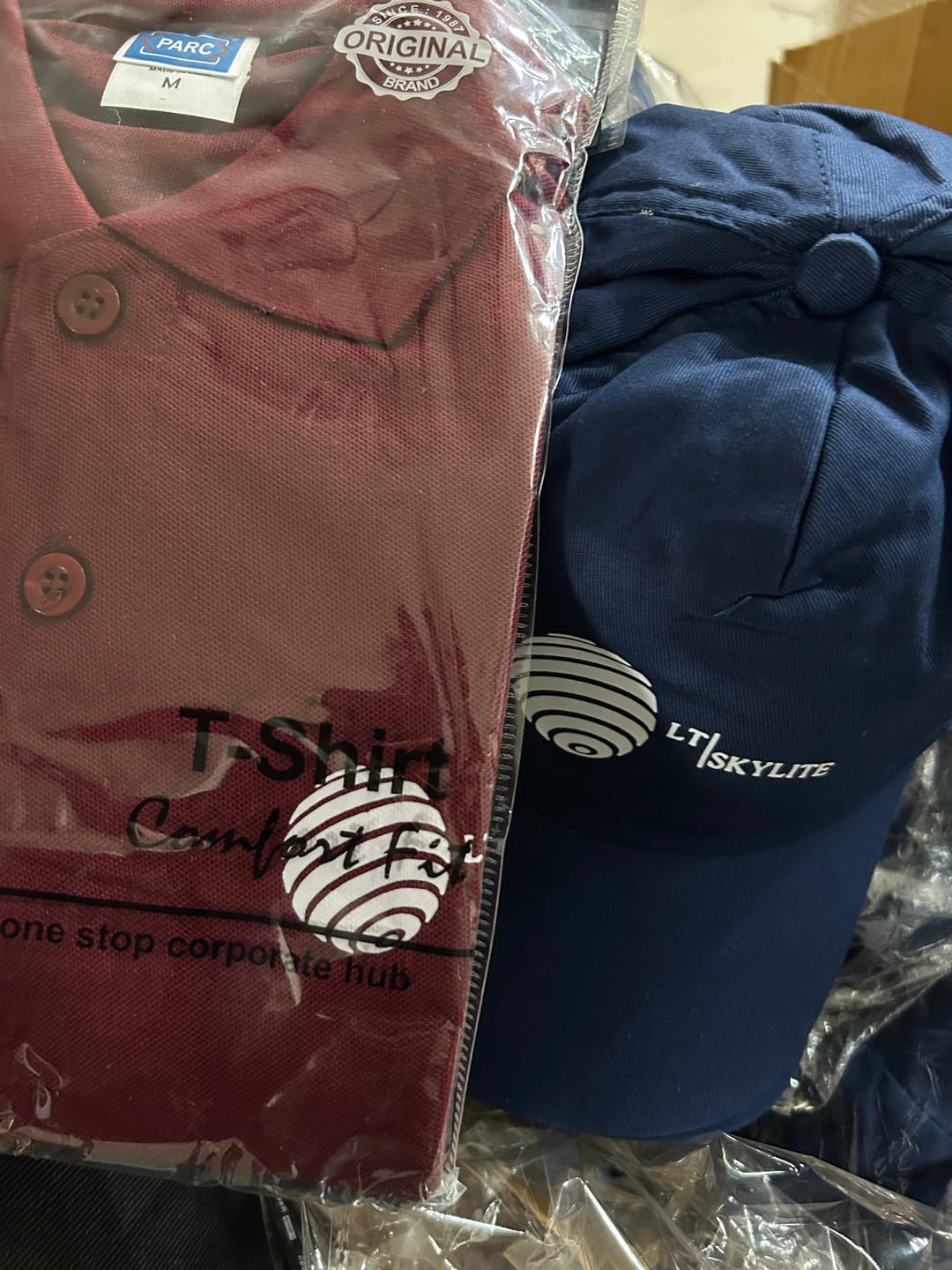 Customer photo review of Customized Polo T-Shirt & Cap  | With Your Company Logo | PrintMine.in