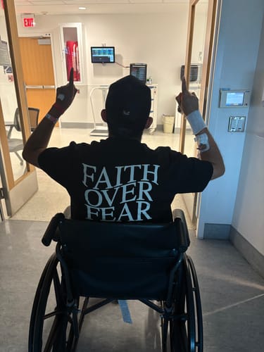 Customer photo review of FAITH OVER FEAR TEE