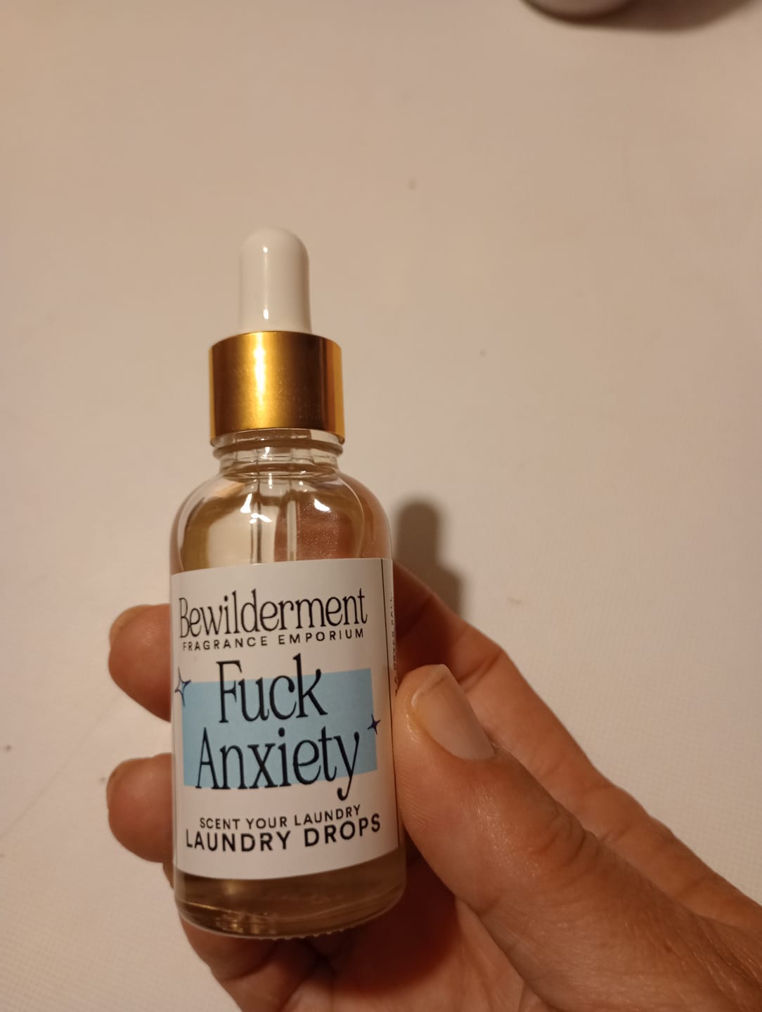 Customer photo review of Fuck Anxiety Laundry Drops