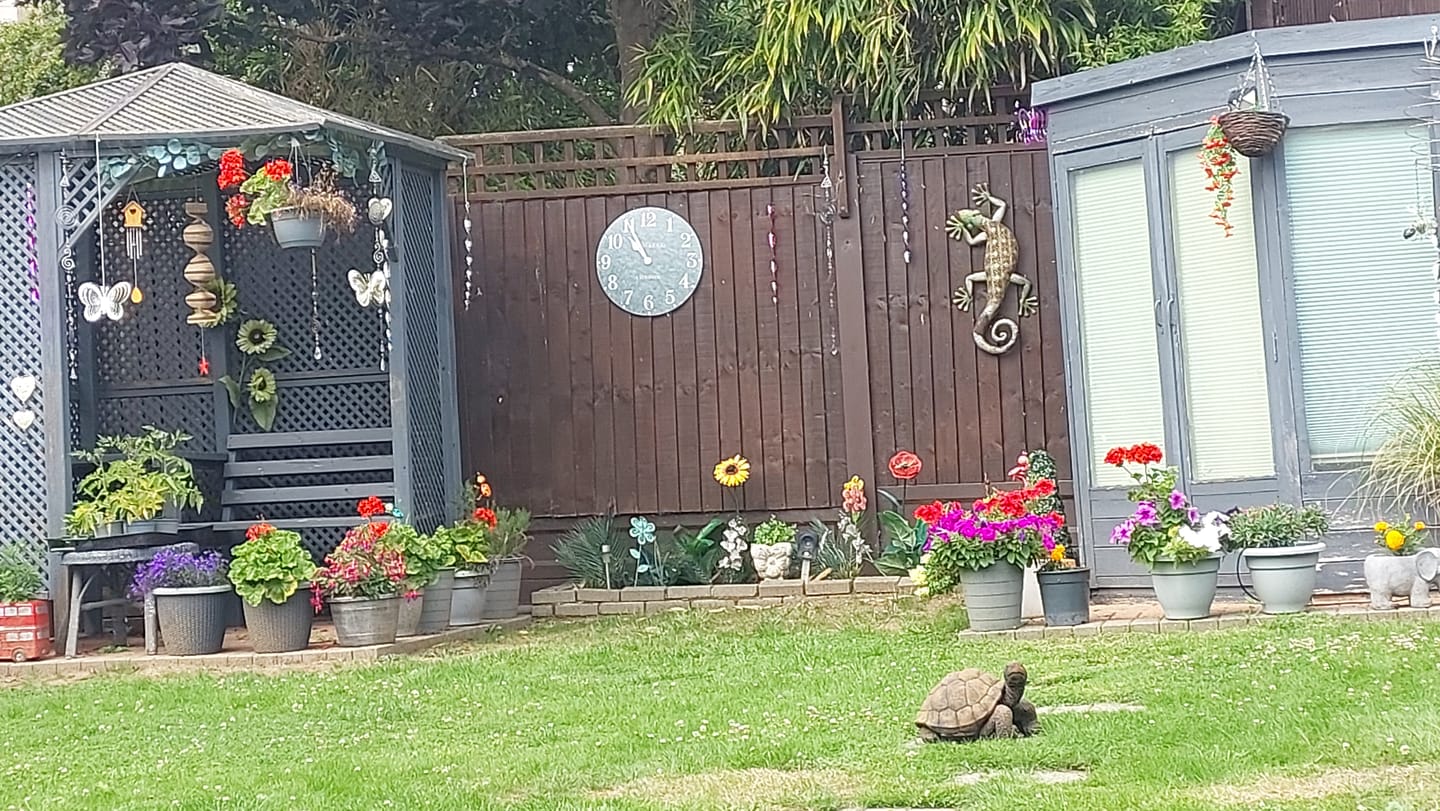 Customer photo review of Thomas Kent London. Arabic Outdoor Wall Clock 20" (51cm) Cement