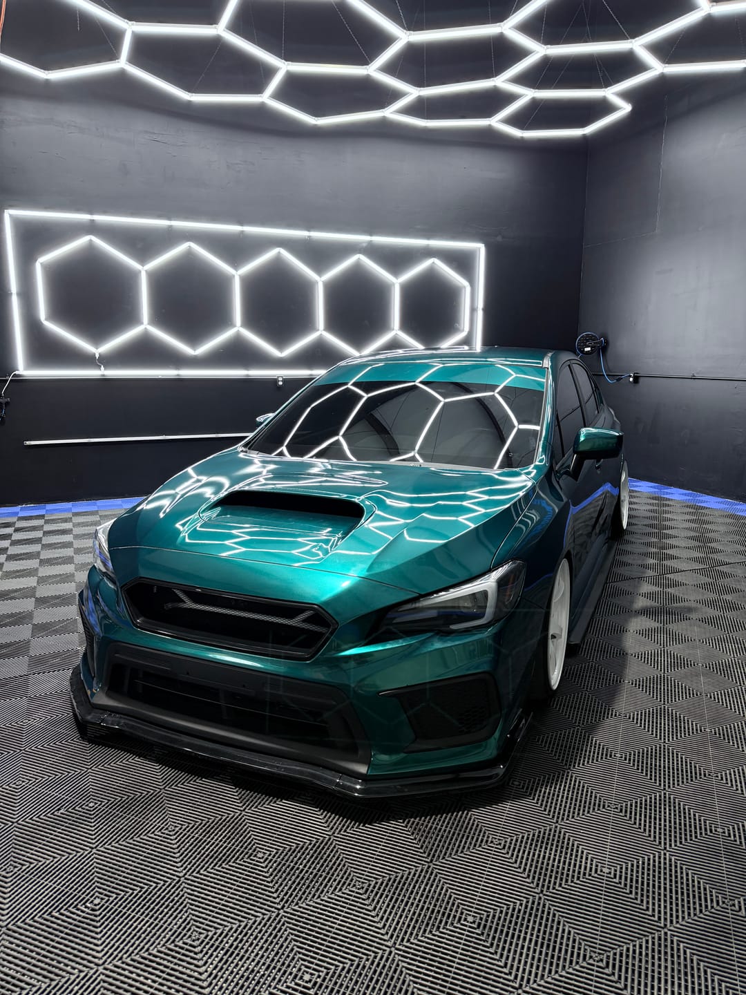 Customer photo review of Glossy Metallic Deep Sea Green Metallic Vinyl Wrap