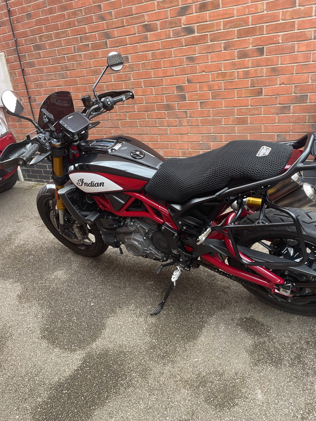 Wind Rider 3D mesh seat cover installed on the seat of an Indian FTR, full bike visible side-on