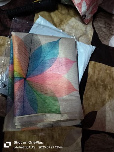 Customer photo review of Light Chikoo Floral Printed Art Silk Saree With Tassels